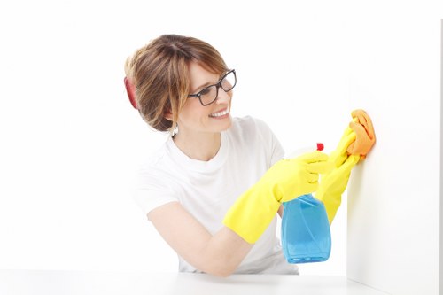 Professional cleaners preparing a Kingstonuponthames flat for move-out inspection